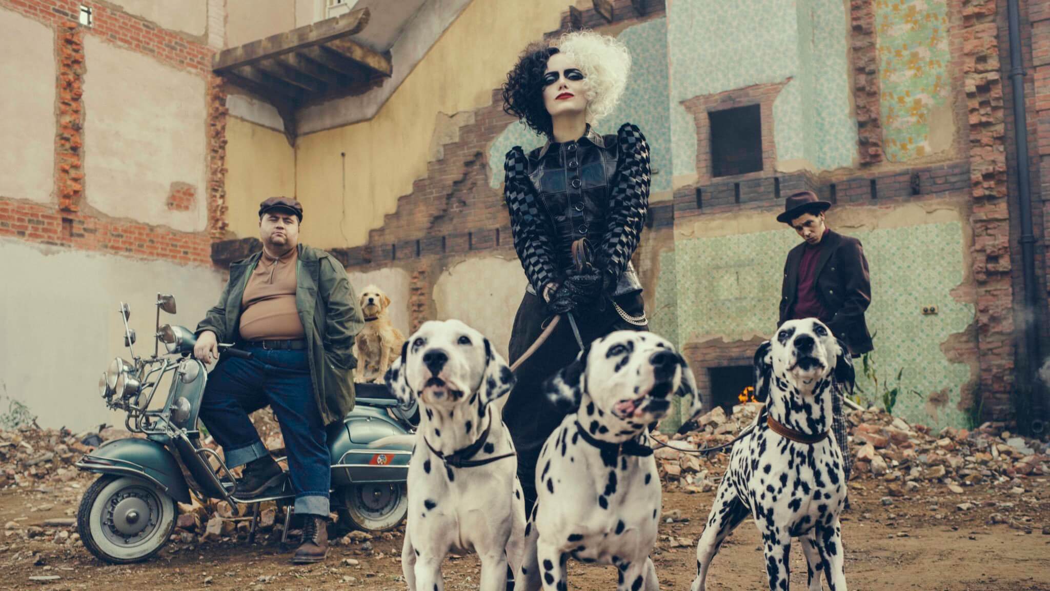 Paul Walter Hauser (left) as Horace, Emma Stone (center) as Cruella, and Joel Fry (right) as Jasper.